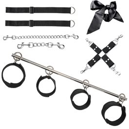 Набір для БДСМ з 26 предметів: наручники, анальні пробки, кільця для пеніса, чікер, кліпси для сосків, маска для очей, плеть, пристрій для розведення ніг та інше. Ідеальний набір для бондейжу та сексуальних ігор